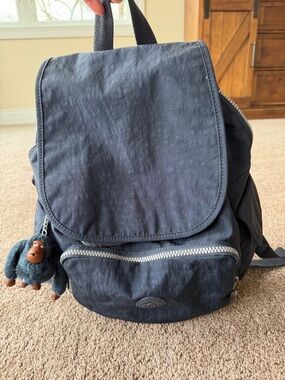 Kipling Dark Blue Canvas Backpack with Monkey Keychain